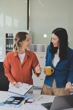 Team of UI UX web designer are working together to develop mobile responsiv.. Stock Photos