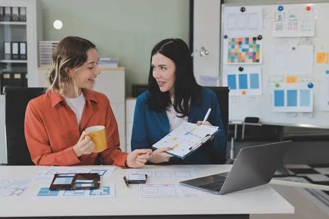 Team of UI UX web designer are working together to develop mobile responsiv.. Stock Photos
