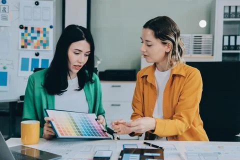 Team of UI UX web designer are working together to develop mobile responsiv.. Stock Photos