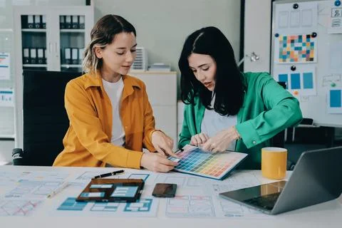 Team of UI UX web designer are working together to develop mobile responsiv.. Stock Photos
