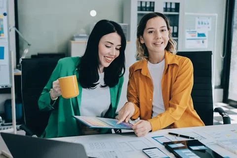 Team of UI UX web designer are working together to develop mobile responsiv.. Stock Photos