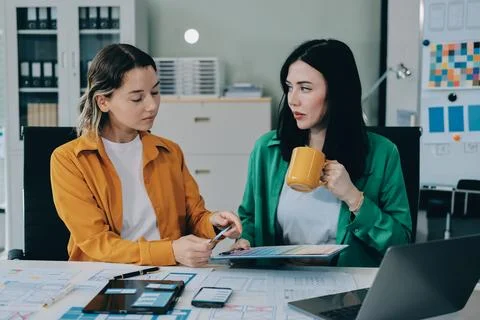 Team of UI UX web designer are working together to develop mobile responsiv.. Stock Photos