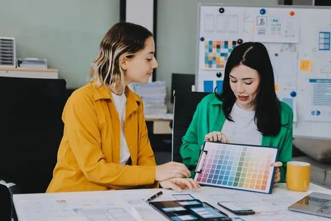 Team of UI UX web designer are working together to develop mobile responsiv.. Stock Photos