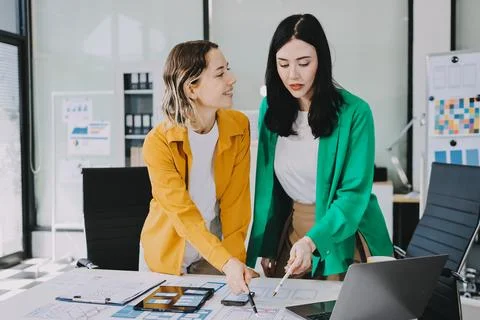 Team of UI UX web designer are working together to develop mobile responsiv.. Stock Photos