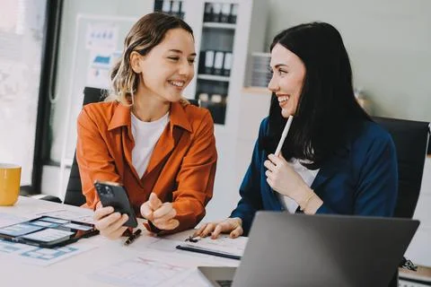 Team of UI UX web designer are working together to develop mobile responsiv.. Stock Photos