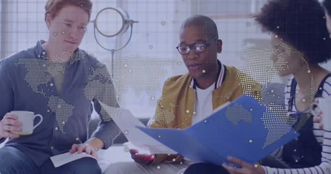 Team unfolding folder, leaning and reviewing documents while map graphics Stock Footage 327956762