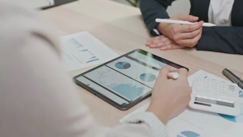 Team of unrecognized business people working together in the meeting room 스톡 동영상 334654576