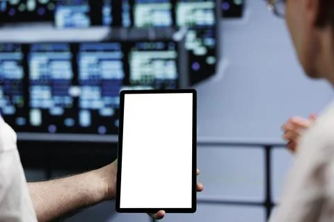 Team using tablet in data center Stock-Fotos