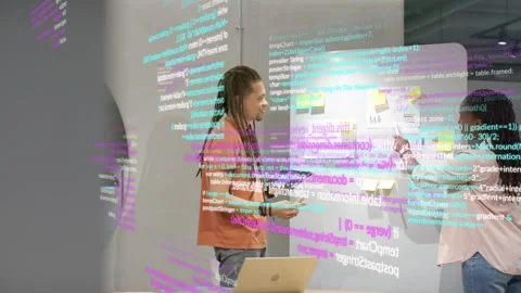 Team using tablet placing notes on plan board for tech sync, tablet sparking Stock Footage 330032159