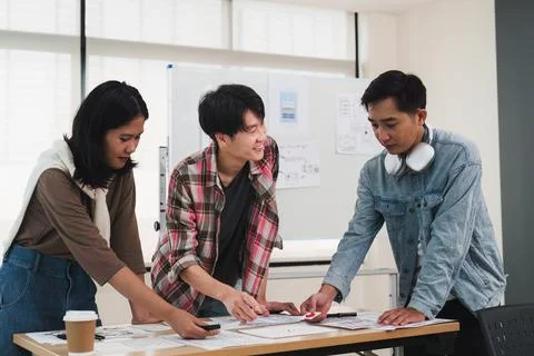 Team of ux developer and ui designer brainstorming interface wireframe design 스톡 사진