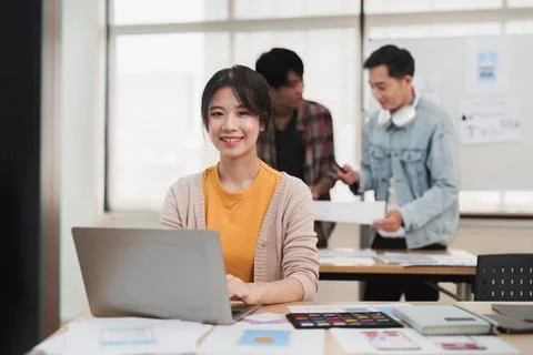 Team of ux developer and ui designer brainstorming interface wireframe design Stock Photos