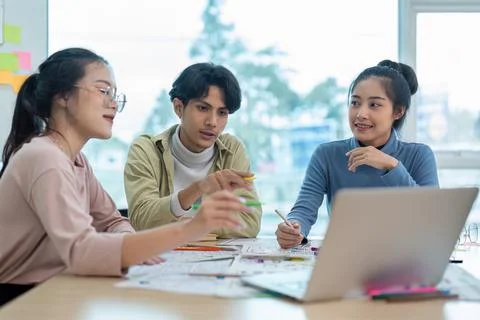 Team of ux developer and ui designer brainstorming interface wireframe design Foto stock
