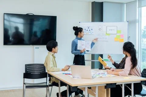 Team of ux developer and ui designer brainstorming interface wireframe design Foto stock