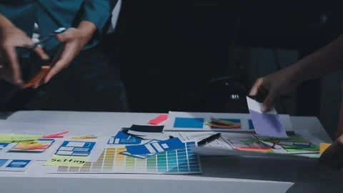 Team of uxui designers pointing at computer screen, discussing new mobile a.. Stock Footage 330325673