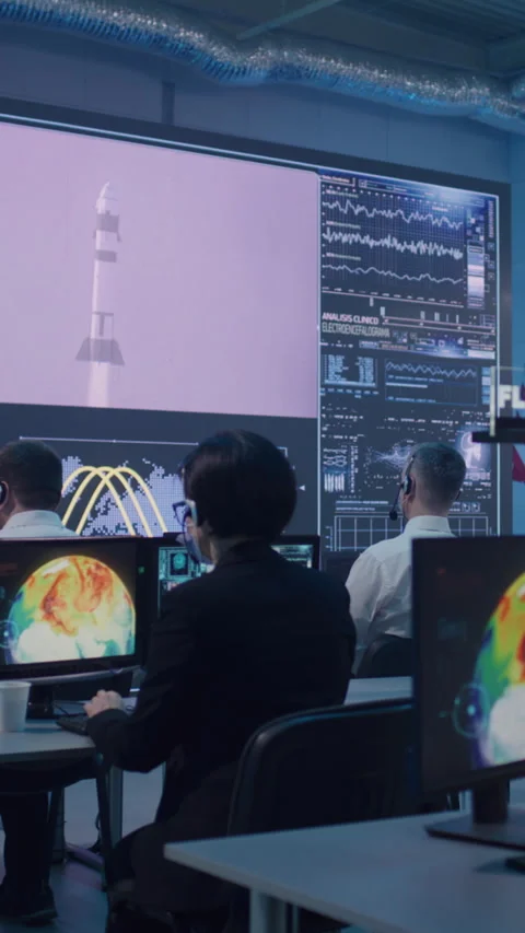 Team watching rocket launch in office Stock Footage 274381934
