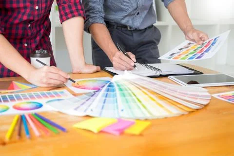 Team Web designer working drawing something on graphic computer in the office Stock Photos