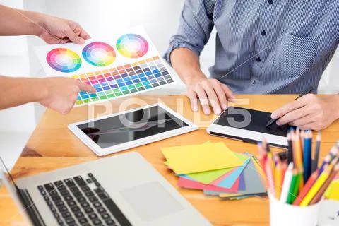 Team Web designer working drawing something on graphic computer in the office Stock Photos