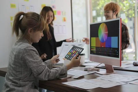 Team of web developers are working and planning application layout prototype  Stock Photos