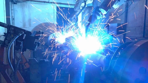 Team welding robots represent the movement in the automotive parts industry Video stock 110288155