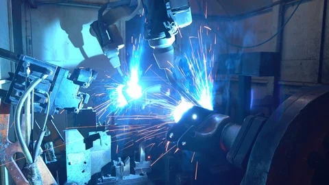 Team welding robots represent the movement in the automotive parts industry Video stock 110288825