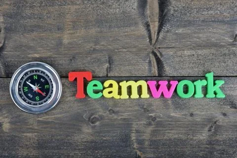 Team on wooden table Foto stock