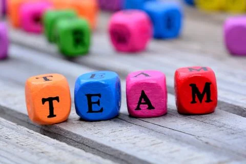 Team word on table Stock Photos