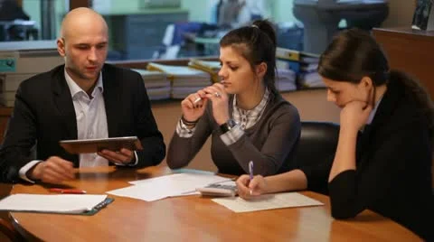 Team work in the office with tablet Stock Footage 10800816