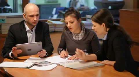 Team work in the office with tablet Stock Footage 10801380