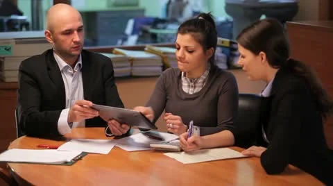 Team work in the office with tablet Stock Footage 10888277