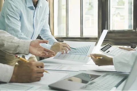 Team work process. Young business managers crew working with new startup pr.. Stock Photos