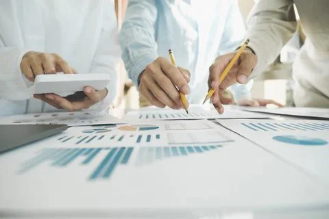 Team work process. Young business managers crew working with new startup pr.. Stock Photos