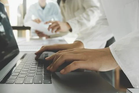 Team work process. Young business managers crew working with new startup pr.. Stock Photos