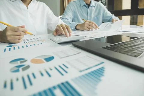 Team work process. Young business managers crew working with new startup pr.. Stock Photos