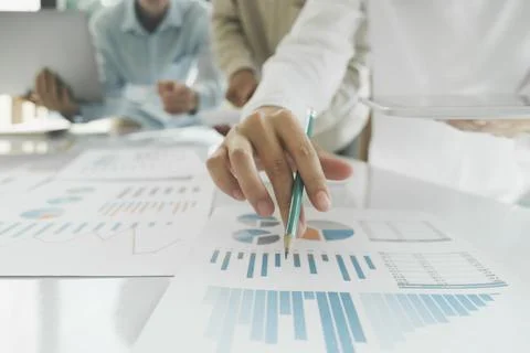 Team work process. Young business managers crew working with new startup pr.. Stock Photos