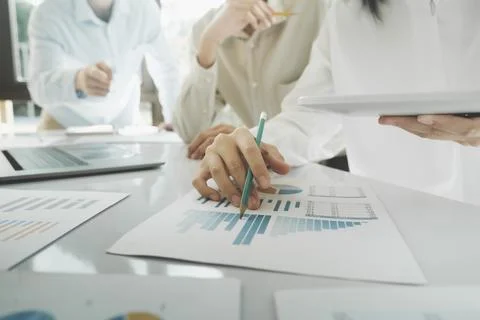 Team work process. Young business managers crew working with new startup pr.. Stock Photos