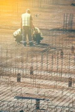 Team work on reinforcement metal framework Stock Photos