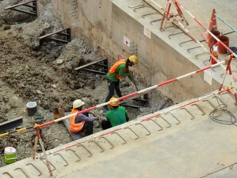 Team of worker in a construction area work with steel  structure Foto stock
