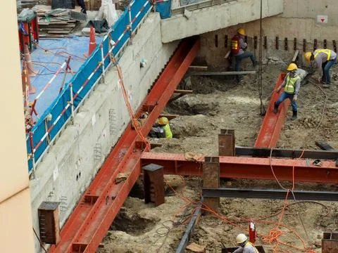 Team of worker in a construction area work with steel  structure Foto stock