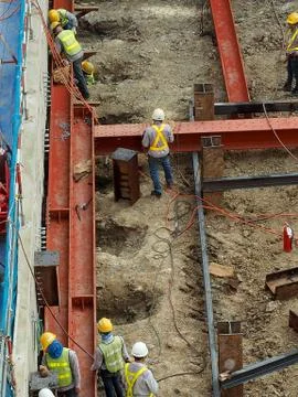 Team of worker in a construction area work with steel  structure Stock Photos