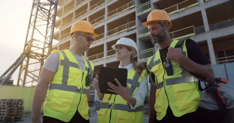 Team of Workers and Engineers Work On Construction Stock Footage 326456877