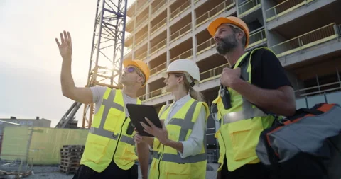 Team of Workers and Engineers Work On Construction Stock Footage 326456993