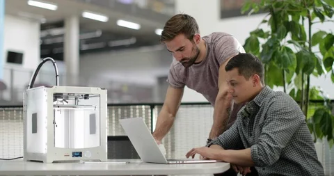 Team working with 3D printer Stock Footage 86821202