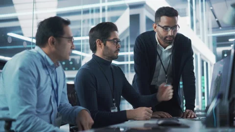 Team Working on Computer in Office Stock Footage 224520207