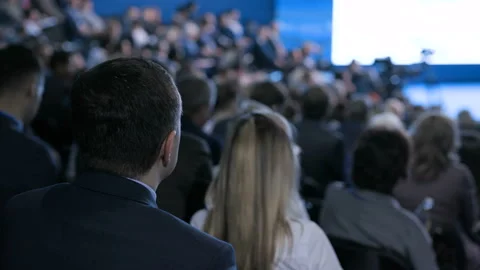 Team working at crowded congress of banking leadership or strategy cooperation i Stock Footage 199475389