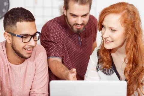 Team working on laptop Stock Photos