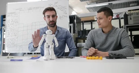 Team working on robotic technology Stock Footage 86810816