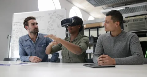 Team working on virtual reality headset Stock Footage 86812138