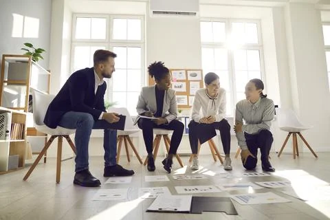 Team of young business professionals developing new strategies in an office Stock Photos