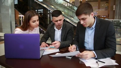 Team of young creative people are discussing a work project Stock Footage 74304551