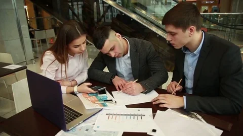 Team of young creative people are discussing a work project Stock Footage 74304622